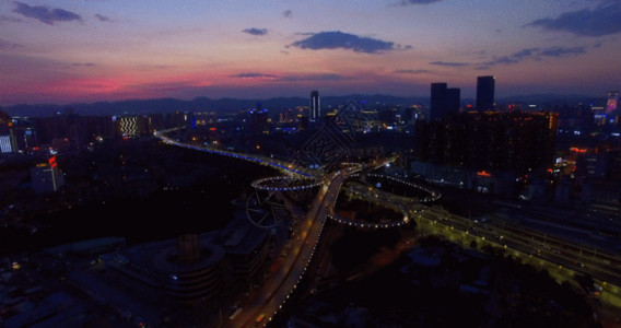 夕阳下建筑夜景灯光GIF高清图片