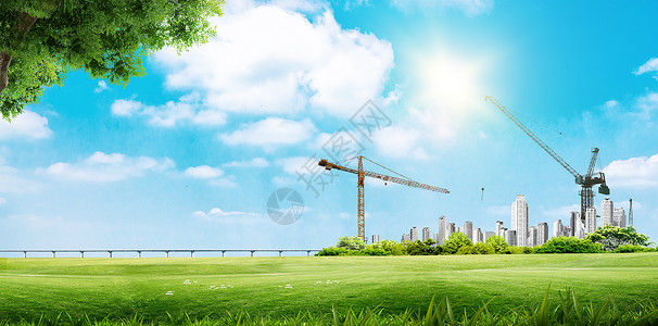 建设蓝天草地城市背景设计图片