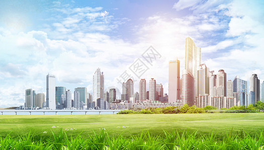 城市建筑绿色天空草地背景设计图片