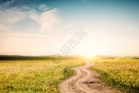 草地黄昏乡村道路设计图片