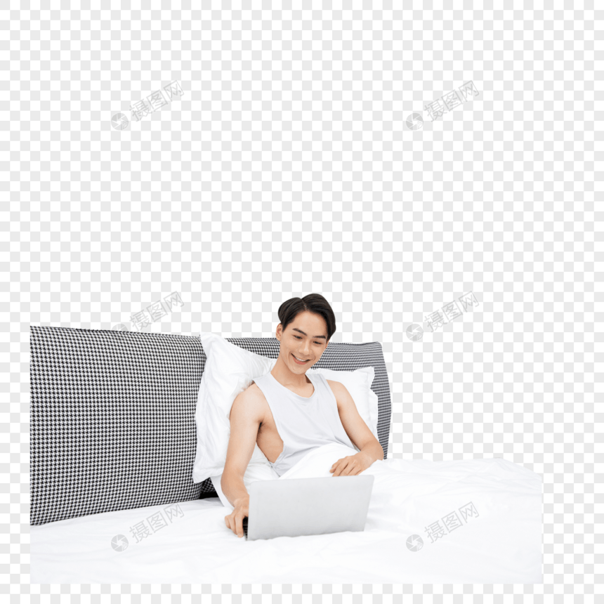 居家男青年床上用电脑图片