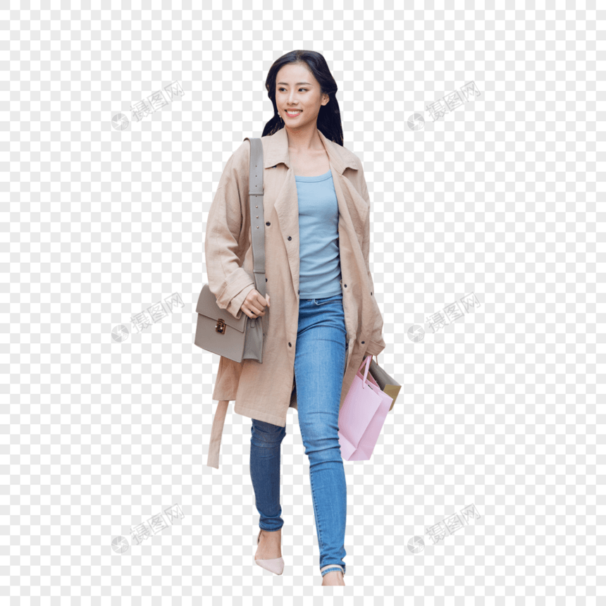 手提购物袋逛街的青年女性图片