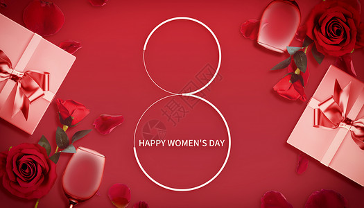 穿红色毛衣的女性手捧礼物盒38妇女节礼物背景设计图片