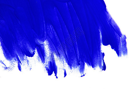 白色背景上的蓝色油漆笔触背景图片