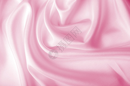 抽象粉红色丝绸背景图片