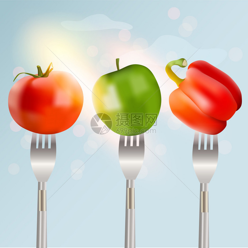 胡椒番茄和苹果在叉子上食物概图片
