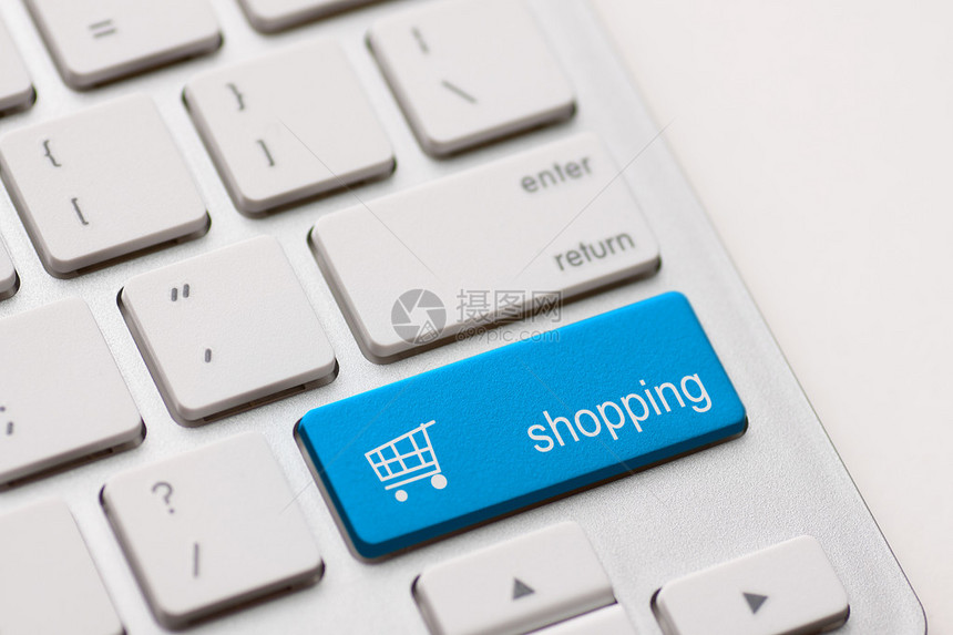 购物在白色键盘上输入按钮键图片