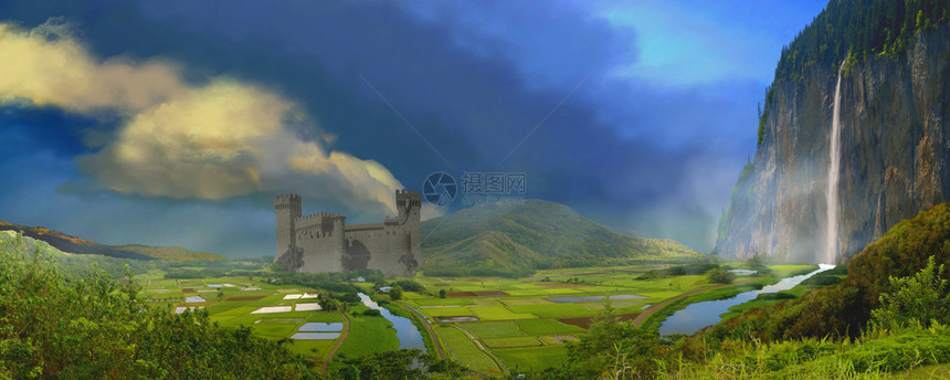 一座城堡坐在农庄的田地和一条由高塔图片