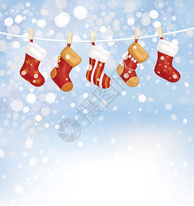 降雪背景上的矢量圣诞袜背景图片