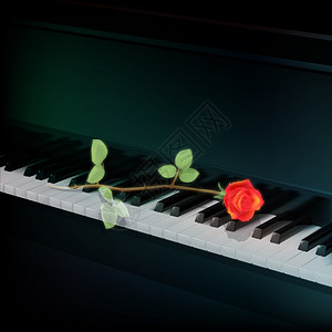 带大钢琴上红玫瑰的图片