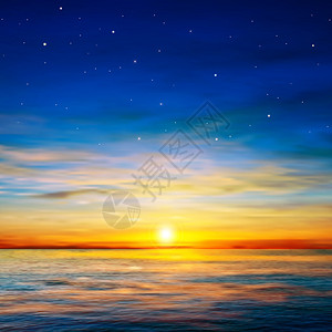 与金色云彩和海洋日出的背景图片