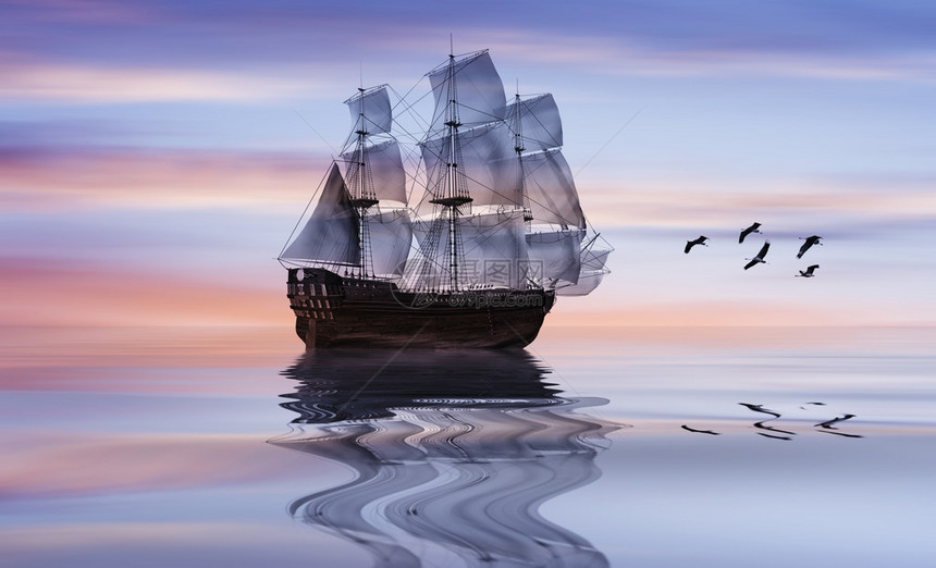 帆船对美丽的日出景观图片