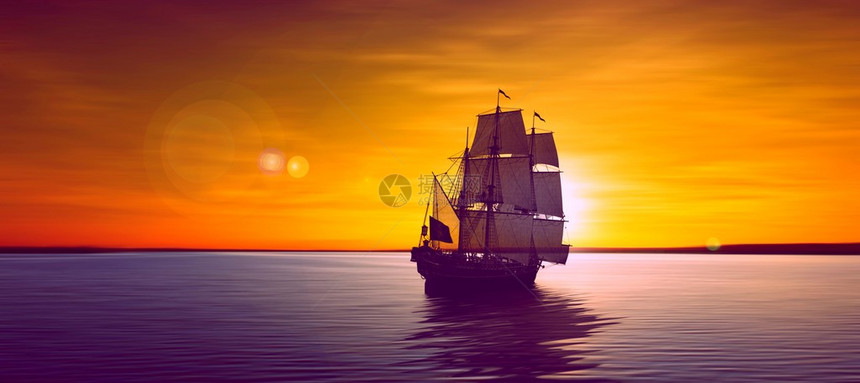 帆船反对美丽的日落景观图片
