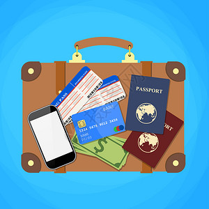 旅行手提箱护照信用卡电话和飞机票空中旅行概念平面设图片