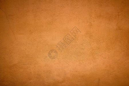 抽象橙色石膏墙纹理背景和纹理图片