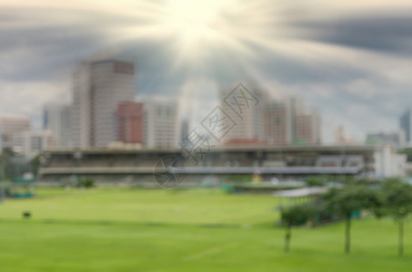 太阳背景城市的抽象模糊照片图片