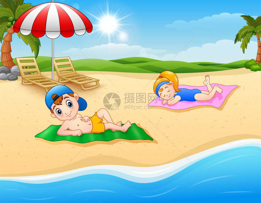 在海滩垫子上做儿童日光图片