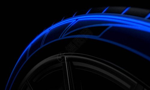 现代式低调轮胎蓝色未来发光模式在黑暗的情绪演播室背景图片