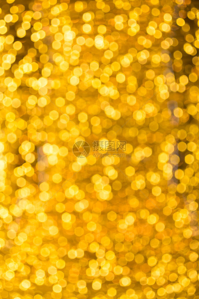 金色抽象灯光上模糊的圣诞节灯光b图片