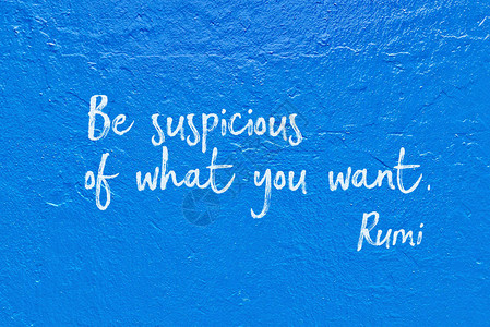 怀疑你想要什么古代波斯诗人和哲学家鲁米在蓝墙上引背景图片