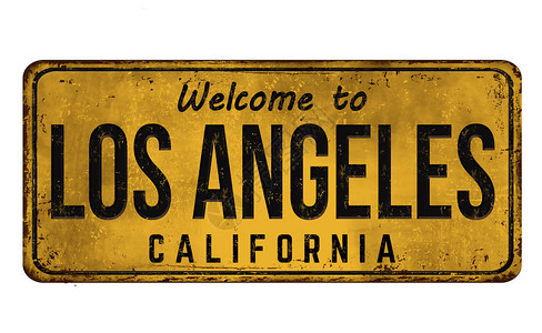 欢迎来到洛杉矶古老的白色背景的生锈金属标图片