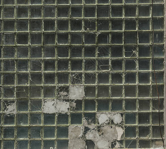 旧绿色玻璃块墙壁背景结缝构背景抽象图片