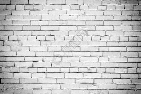 小灰砖墙砖块的纹理光滑的美丽的背图片