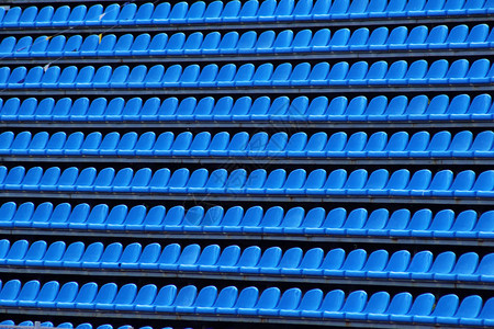 深蓝色座位圆形剧场抽象背景背景图片