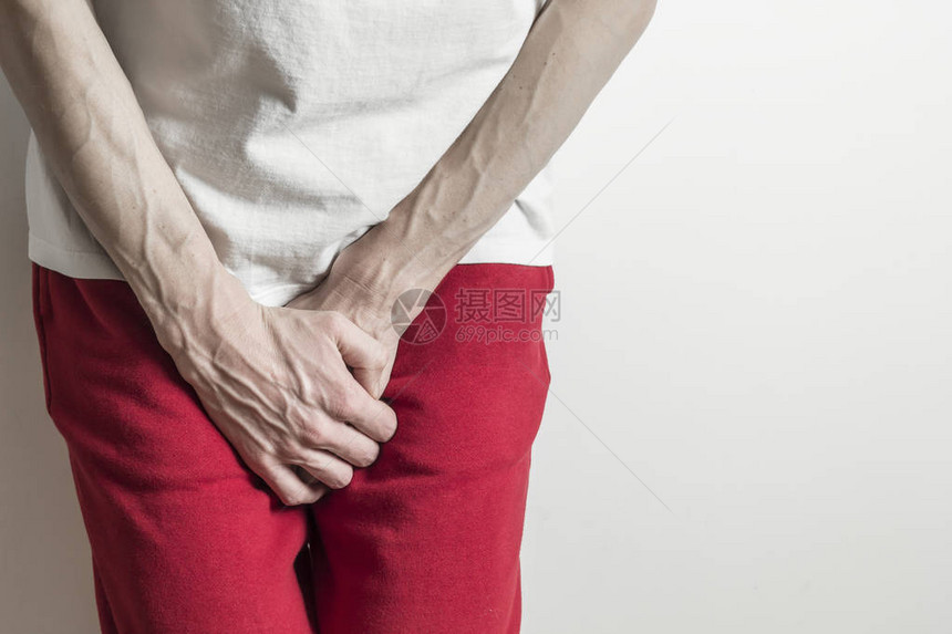 前列腺概念膀胱炎症早孕男人握图片