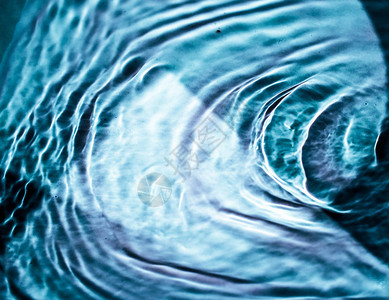 蓝色波纹水抽象背景质地和自然图片