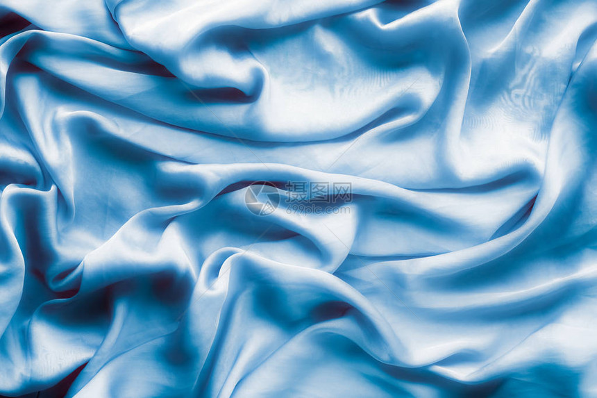 蓝色柔软丝绸波平板优雅的织布纹理抽象背景和现代图片