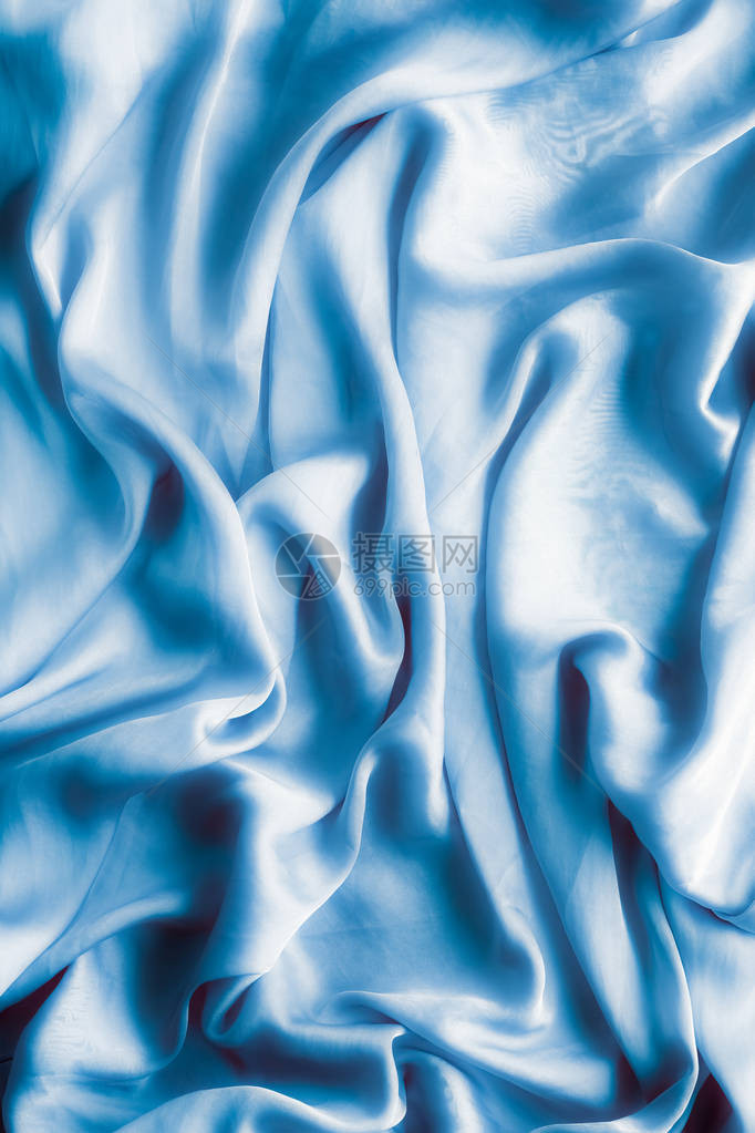 蓝色柔软丝绸波平板优雅的织布纹理抽象背景和现代图片