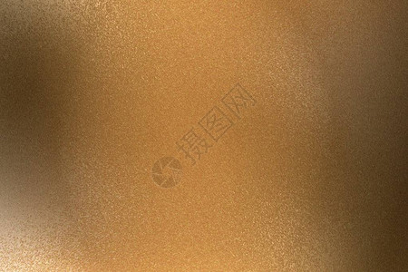青铜拉丝金属板的质感抽象背景图片