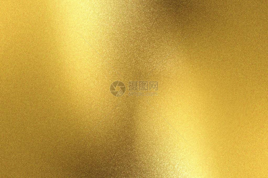 发光的金色属墙面抽象背景图片