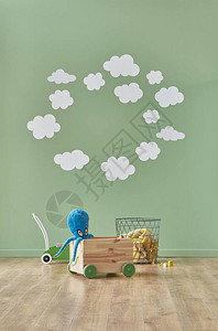 绿色婴儿房墙和云的风格玩具椅图片