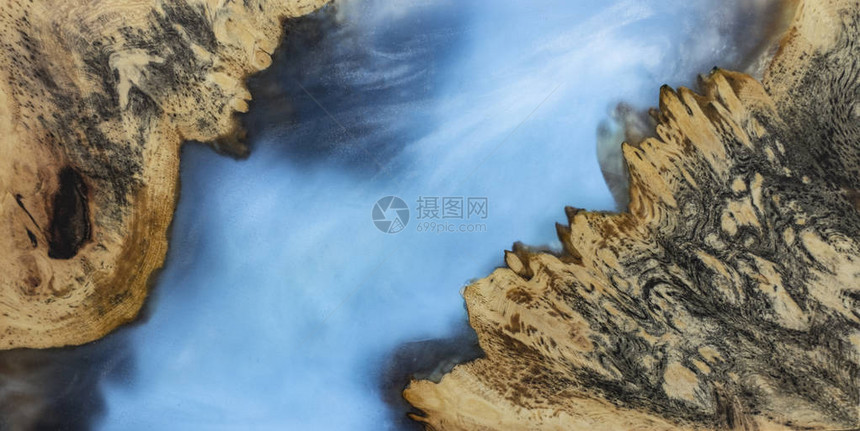 稳定Afzelia卷木的蓝色抽象艺术背景纹图片