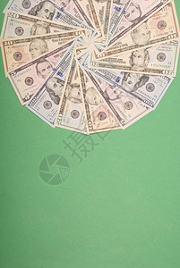 来自金钱的曼达拉千叶眼抽象货币背景光栅模式重复曼达拉圆图片