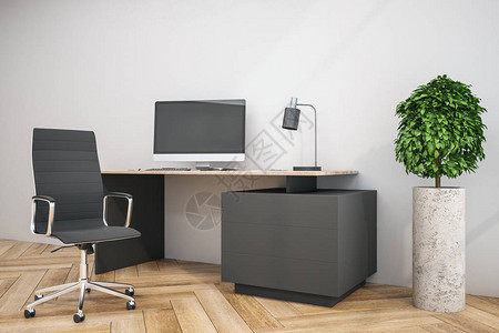 现代设计师桌面与空电脑屏幕键盘和灯图片