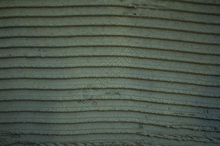 湿粘合层的纹理建筑胶水的结构灰色的图片