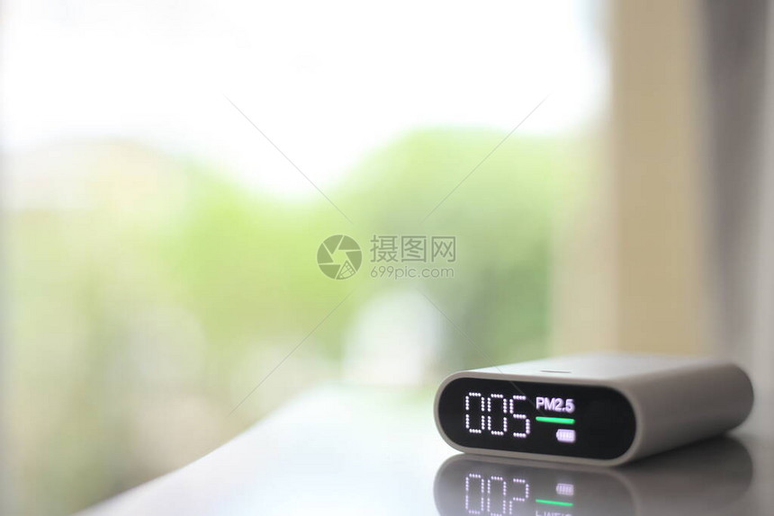 PM25灰尘探测器和绿色散景背颗粒物颗粒灰尘传感器检测清洁空气健康洁净的空气图片