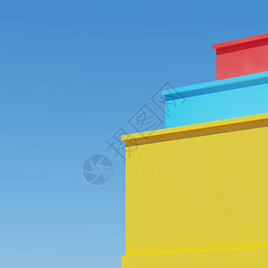 天空背景上的彩色建筑最小的建筑理念概图片