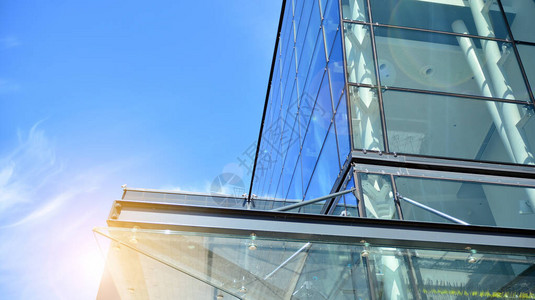 商业建筑关闭蓝色玻璃现代建筑的抽象质感商业背景有阳图片