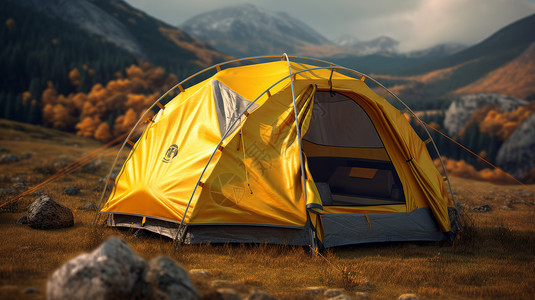 在野外山坡上露营的黄色帐篷图片