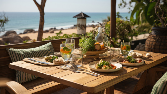 夏日度假海边的木质餐桌与美食高清图片
