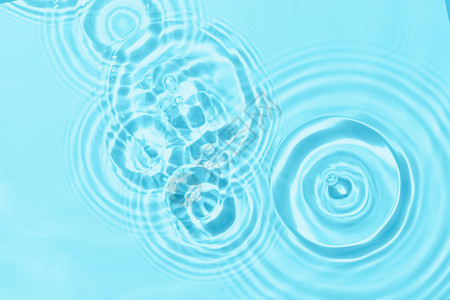 蓝色圆形水珠蓝色唯美水纹创意水背景设计图片