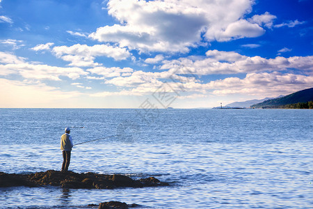 海边垂钓背景图片