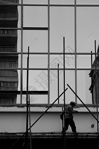 黑白构成建筑工人在施工背景