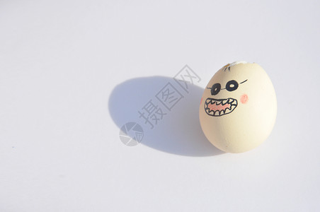 手绘眨眼表情创意鸡蛋背景