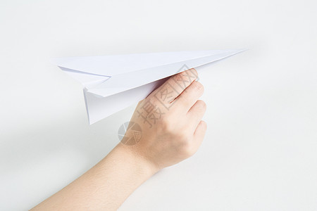 飞纸手拿纸飞机要飞出去设计图片