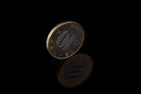 游泳券商业金融硬币纪念币背景